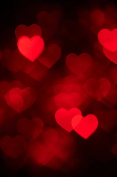 Red heart bokeh background photo, abstract holiday backdrop — Stock Photo, Image