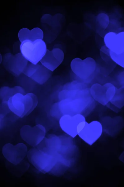 Donker blauw hart bokeh achtergrondfoto, abstracte vakantie achtergrond — Stockfoto