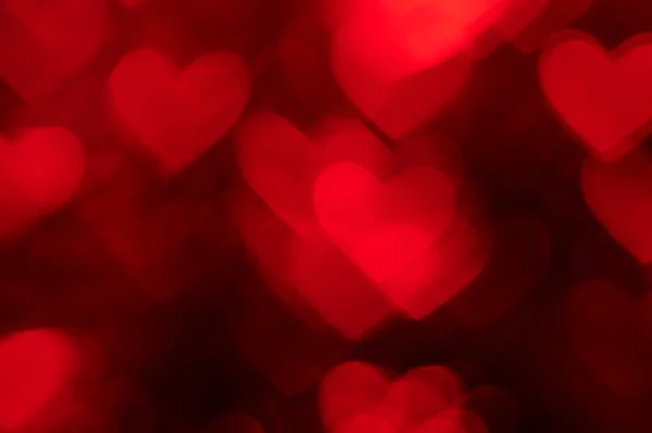Rött hjärta bokeh bakgrundsfoto, abstrakt holiday bakgrund — Stockfoto