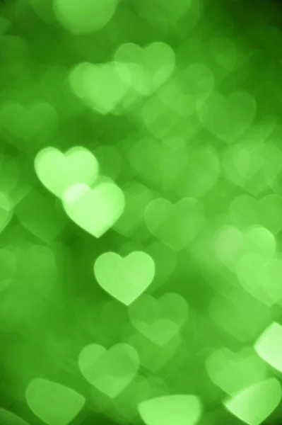 Corazón verde bokeh foto de fondo, fondo abstracto de vacaciones —  Fotos de Stock