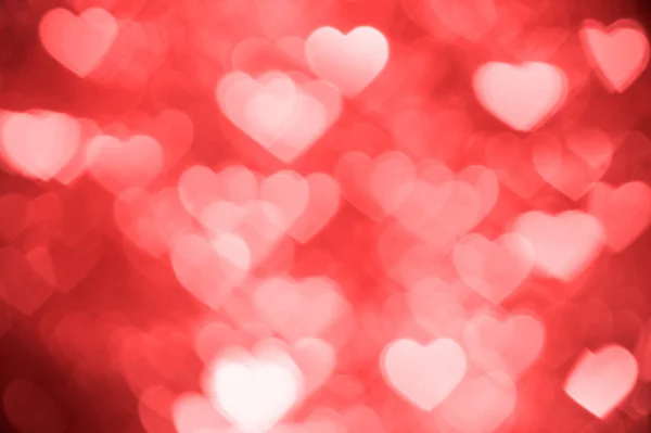 Light red heart bokeh background photo, abstract holiday backdrop — Stock Photo, Image