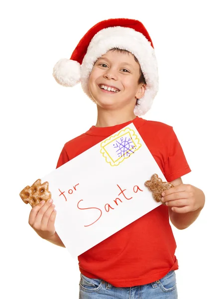 Αγόρι με τα cookies για Σάντα, χειμερινές διακοπές Χριστουγέννων έννοια — Φωτογραφία Αρχείου