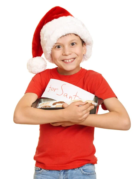 Αγόρι με τα cookies για Σάντα, χειμερινές διακοπές Χριστουγέννων έννοια — Φωτογραφία Αρχείου