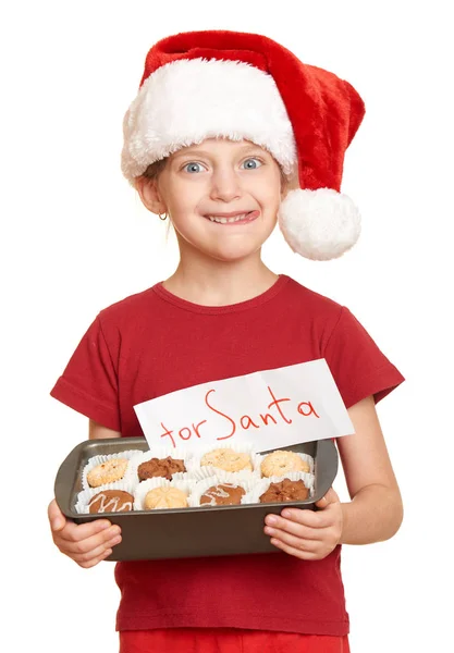 Το κορίτσι με τα cookies για Σάντα, χειμερινές διακοπές Χριστουγέννων έννοια — Φωτογραφία Αρχείου