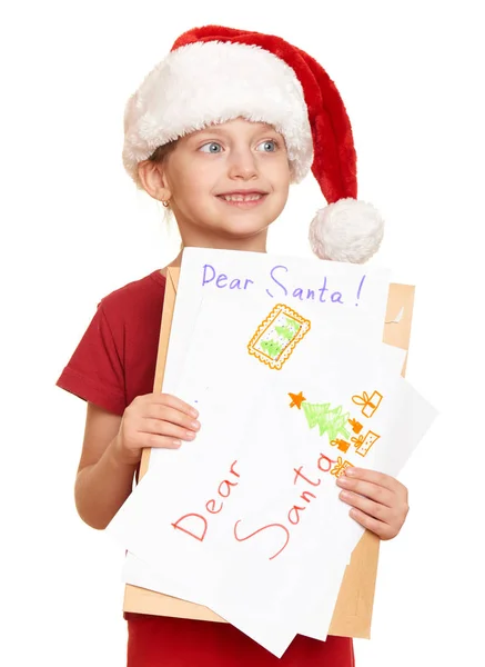 Κορίτσι με το κόκκινο καπέλο με επιστολή προς Σάντα - χειμερινών διακοπών Χριστουγέννων έννοια — Φωτογραφία Αρχείου