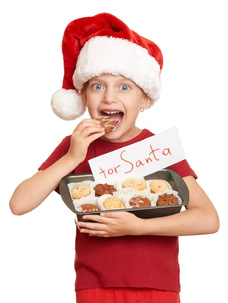 Το κορίτσι με τα cookies για Σάντα, χειμερινές διακοπές Χριστουγέννων έννοια — Φωτογραφία Αρχείου