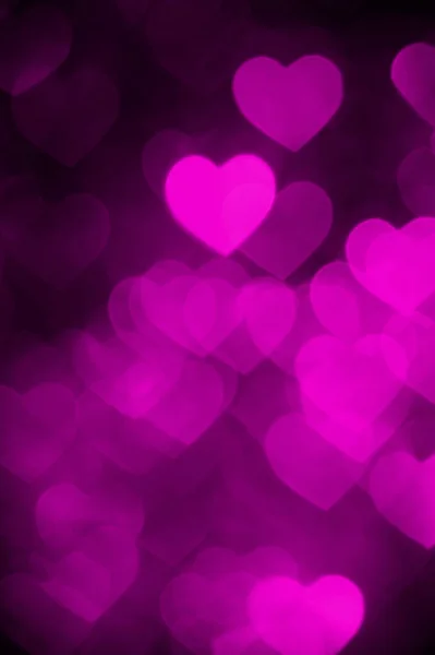 Purpurová barva srdce bokeh pozadí fotografie. Abstraktní svátkem, oslavou pozadí. — Stock fotografie