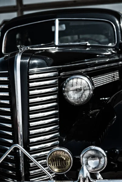 Black retro car closeup, front view — Stock Photo, Image