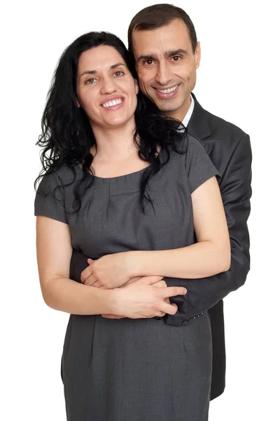 Romantische paar poseren, gekleed in zwarte pak, geïsoleerd wit — Stockfoto