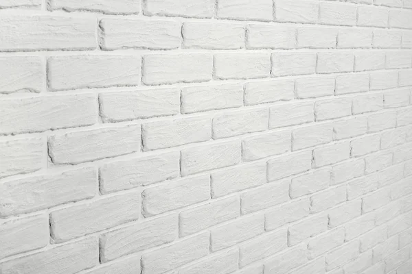 Witte bakstenen muur, hoekmening, abstracte achtergrondfoto — Stockfoto