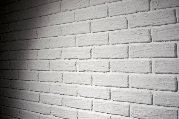 White brick wall with light effect and shadow, abstract background photo, side view — Stock Photo, Image