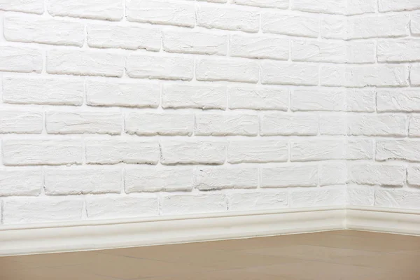 White brick wall with tiled floor and corner, abstract background photo — Stock Photo, Image