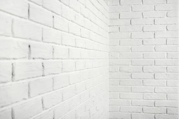 コーナーでは、抽象的な背景の写真で白いレンガの壁 — ストック写真