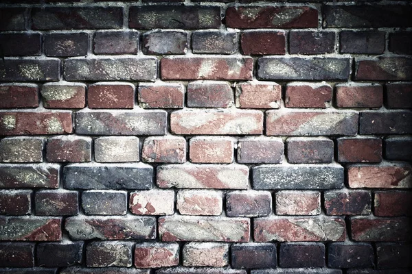 Old brick wall for texture or background, vignette effect — Stock Photo, Image