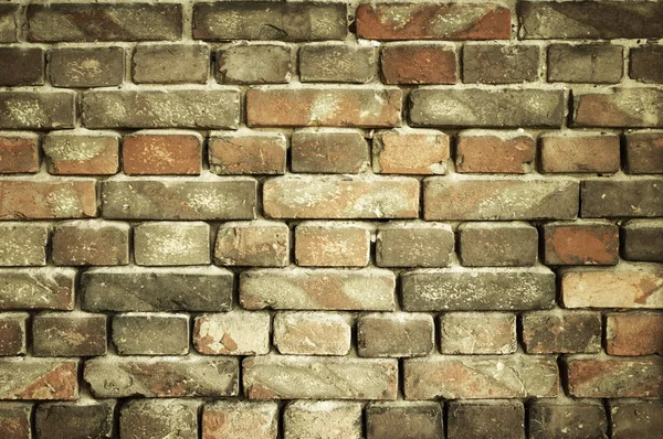 Old brick wall for texture or background, yellow toned — Stock Photo, Image