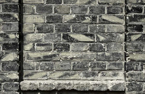 Old brick wall for texture or background, dark color, architectural elements as a brick filled frame — Stock Photo, Image