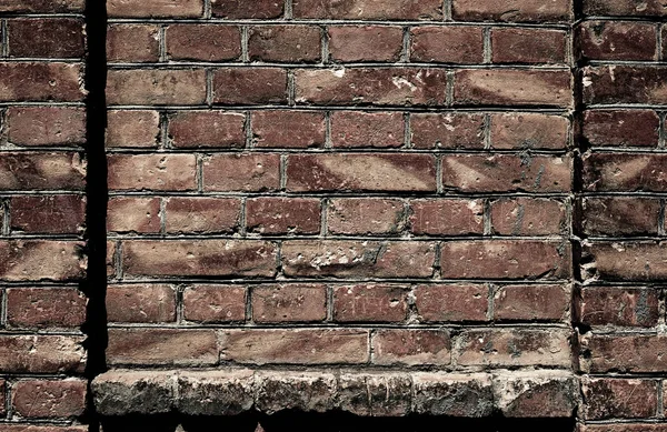 Old brick wall for texture or background, dark color, architectural elements as a brick filled frame — Stock Photo, Image