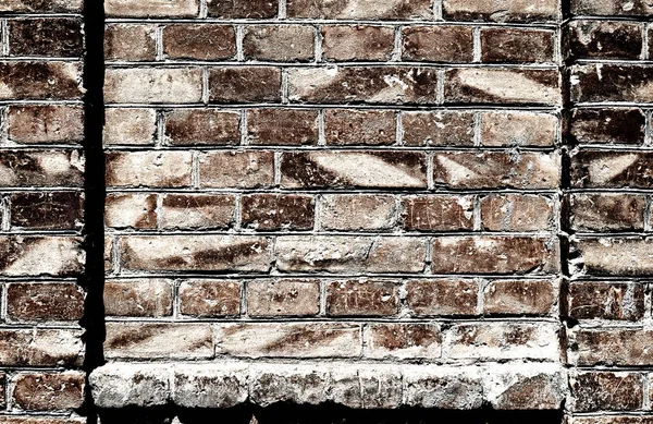 Old brick wall for texture or background, dark color, architectural elements as a brick filled frame — Stock Photo, Image