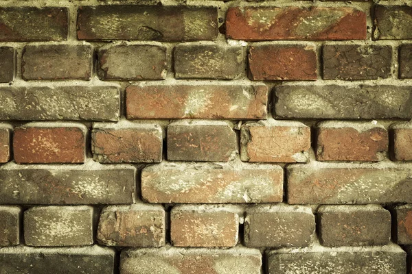 Old brick wall for texture or background, yellow toned — Stock Photo, Image