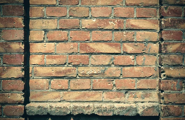 Old brick wall for texture or background, dark color, architectural elements as a brick filled frame — Stock Photo, Image