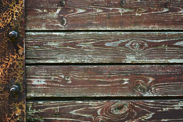 Holzgrund aus alten Dielen mit eiserner Befestigung, horizontale Anordnung in einer Reihe — Stockfoto