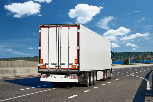 Trucks with cargo on highway, shipping and transportation concept — Stock Photo, Image