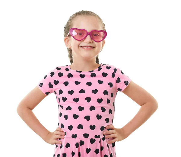 Pretty little girl studio portrait, dressed in pink with heart shapes, white background — Stock Photo, Image