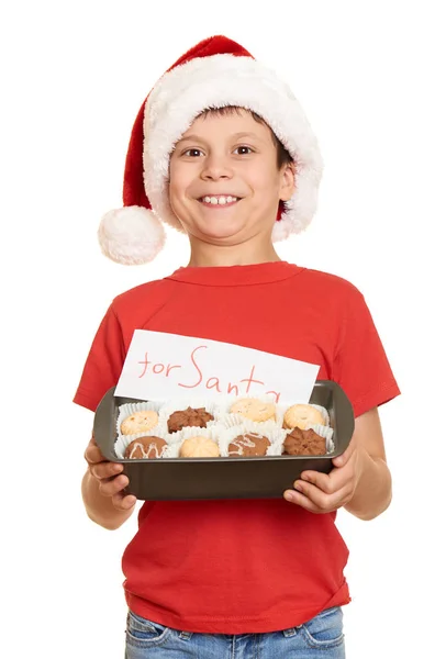 Bambino vestito con cappello da Babbo Natale isolato su sfondo bianco. Capodanno e concetto di vacanza invernale . — Foto Stock