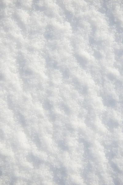 Nieve para textura o fondo en el día soleado, luz brillante con sombras, puesta plana, vista superior, limpio y nadie — Foto de Stock