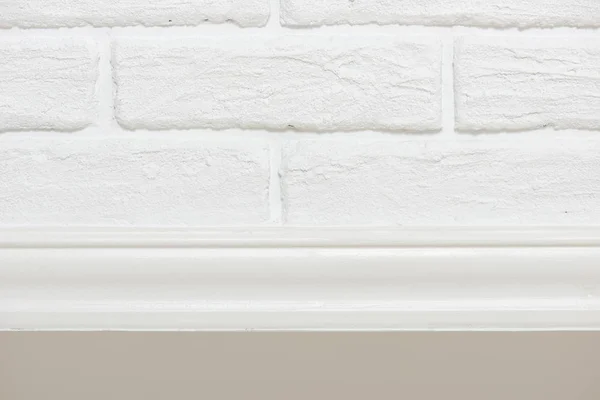 Witte bakstenen muur met woord voor achtergrond of textuur, abstracte foto — Stockfoto