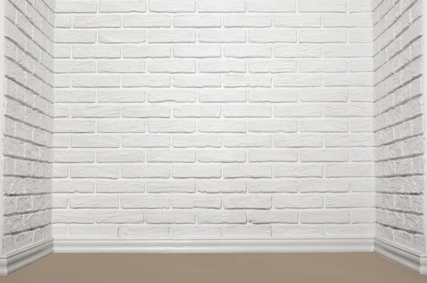 The corner of the room with white brick wall and floor, abstract background photo — Stock Photo, Image