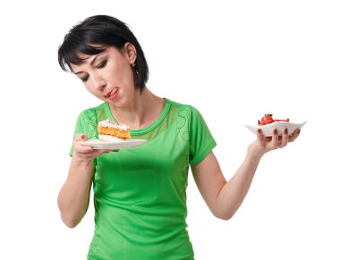 çilek ve tatlı kek, beyaz zemin üzerine, sağlıklı gıda kavramı ayrı tut arasında kız seçim