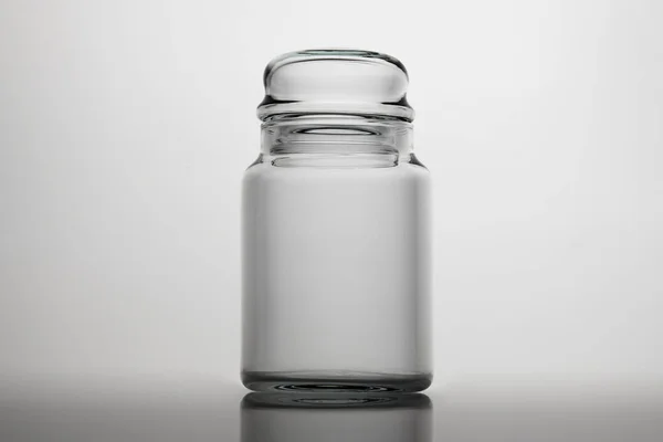 Empty glass jar on a white background — Stock Photo, Image