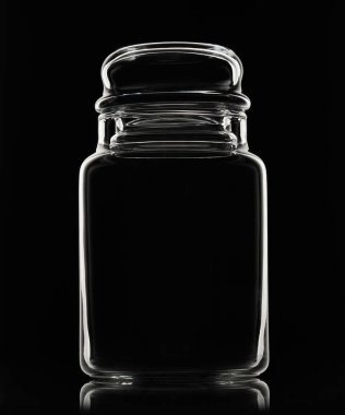 Siyah arka planda boş cam kavanozun beyaz silueti