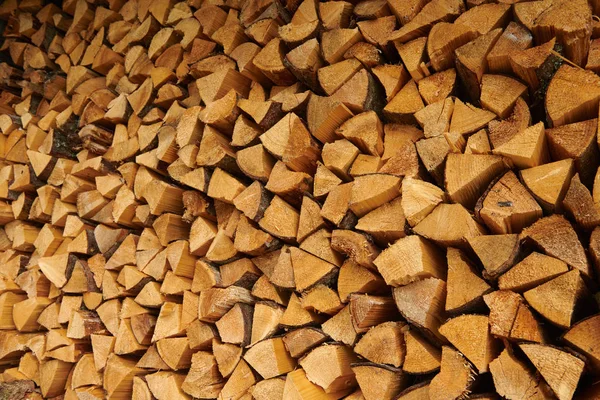 Pile of wood cut for fireplace — Stock Photo, Image