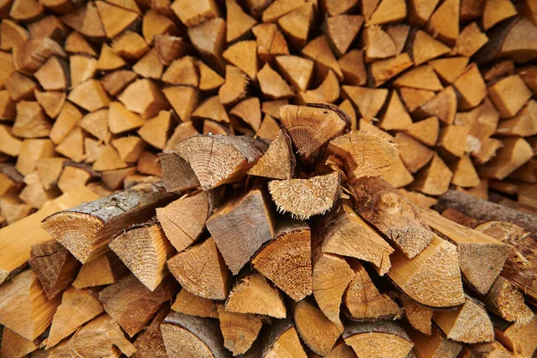 Pile of wood cut for fireplace — Stock Photo, Image