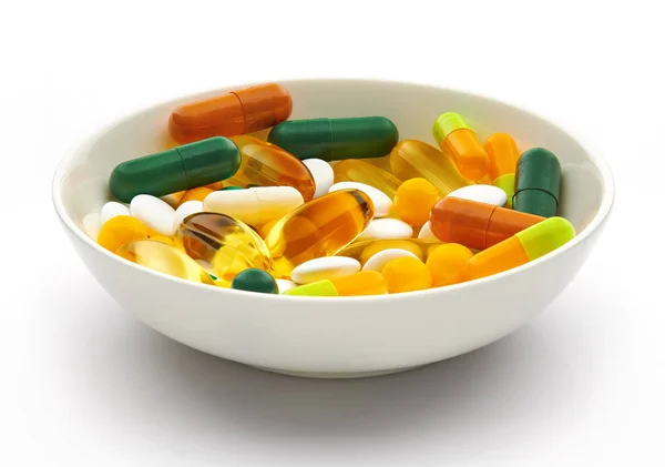 Placa com conjunto de comprimidos, comprimidos, vitaminas, medicamentos, ómega-3 óleo de peixe, cápsulas de gel, medicamentos e suplemento alimentar para cuidados de saúde. Indústria farmacêutica. Farmácia . — Fotografia de Stock
