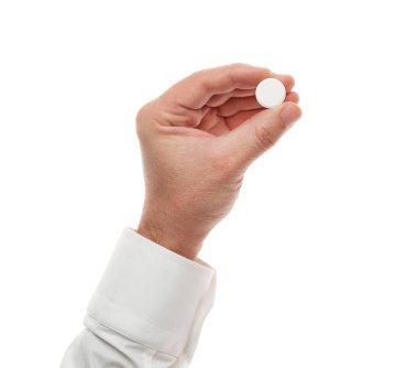 Man hand with one big white pill isolated on white background. White shirt, business style. Medicament and food supplement for health care. Pharmaceutical industry. Pharmacy.
