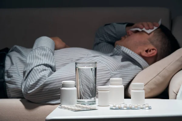 Overworked Businessman Lying Sofa Resting Pills Glass Water Him — Stock Photo, Image