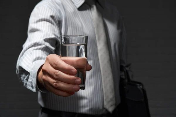 Businessman Closeup Portrait Standing Posing Glass Water Dark Wall Background — Stock Photo, Image