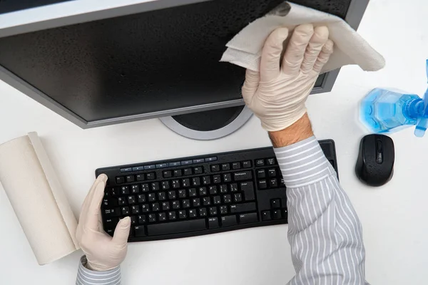 Concept Cleaning Disinfecting Office Businessman Cleans Workplace Computer Desk Uses — Stock Photo, Image