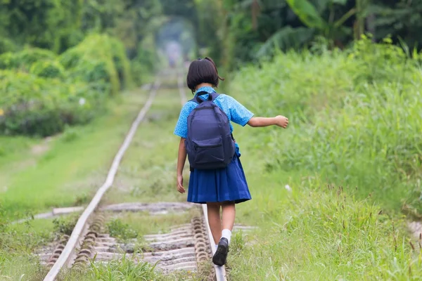 Girl walking on railway — Stock Photo, Image