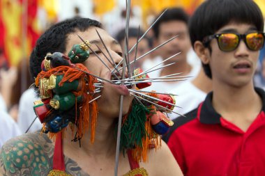 Taoist devotee extreme piercing clipart