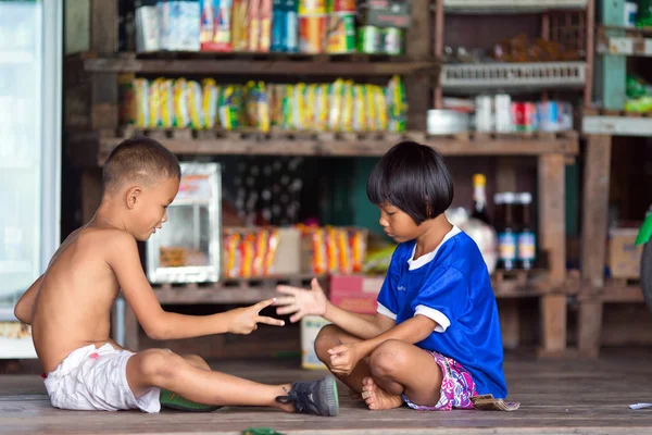 Boys playing scissor rock paper game — Stock Photo, Image