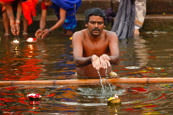 Man traditional bathing in Ganges river