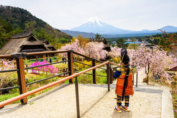 Samurai boy at farming village by Mt. Fuji