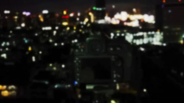Bild der Kamera mit nächtlichem Stadtbild verwischen — Stockfoto