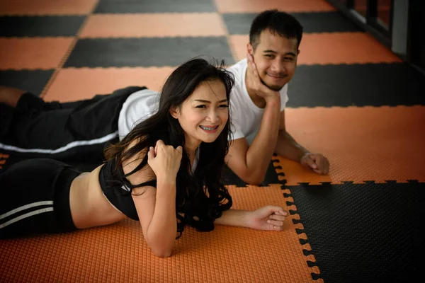 couple in love at gym sport club