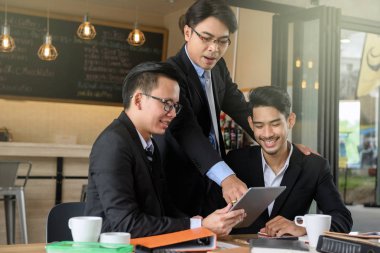 işadamı patron tarafından tablet Takım Koçluğu 