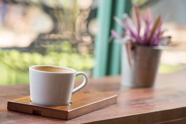 Hot Latte coffee by window — Stock Photo, Image